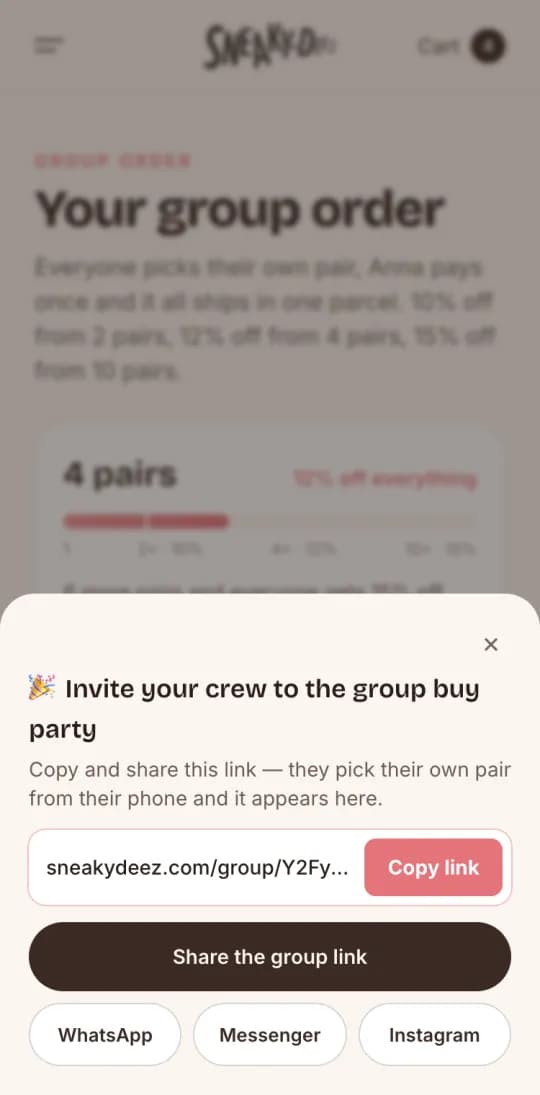 The group page on a phone with the invite sheet open: a copy-link button and share buttons for WhatsApp and more