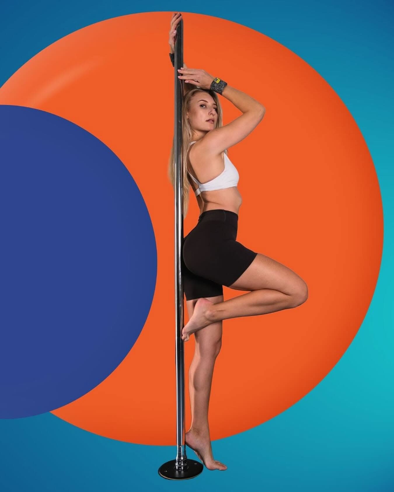 Pole dancer wearing SneakyDeez wrist wraps against bold orange and blue circles